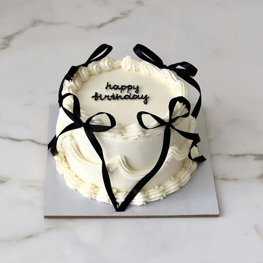 Vintage black Bow butter cream birthday cake