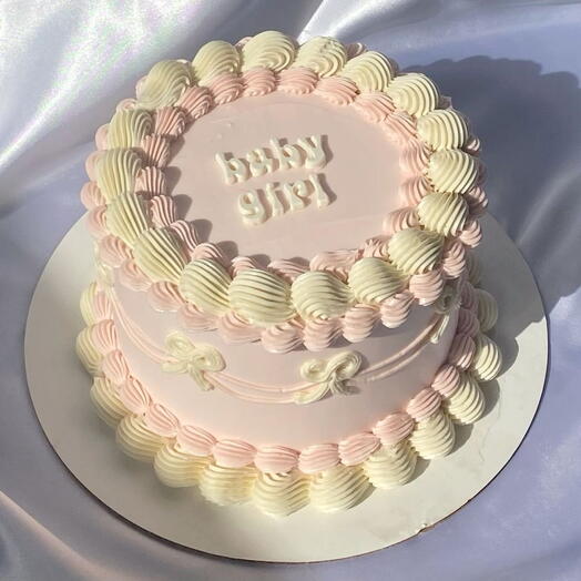 8 inch pink and white bow cake