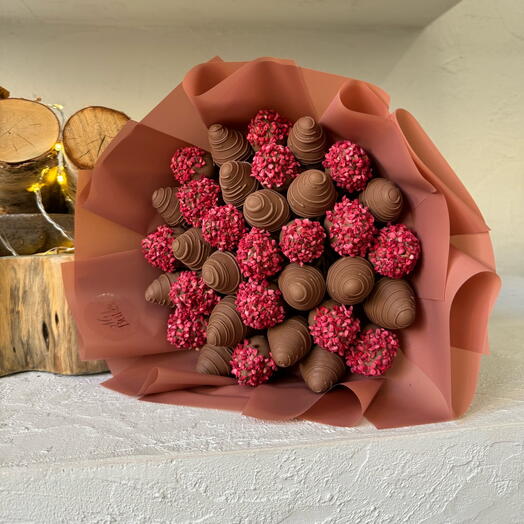 Bouquet of chocolate-covered strawberries with raspberries