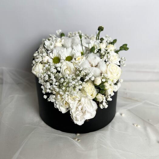 Flowers in a black box