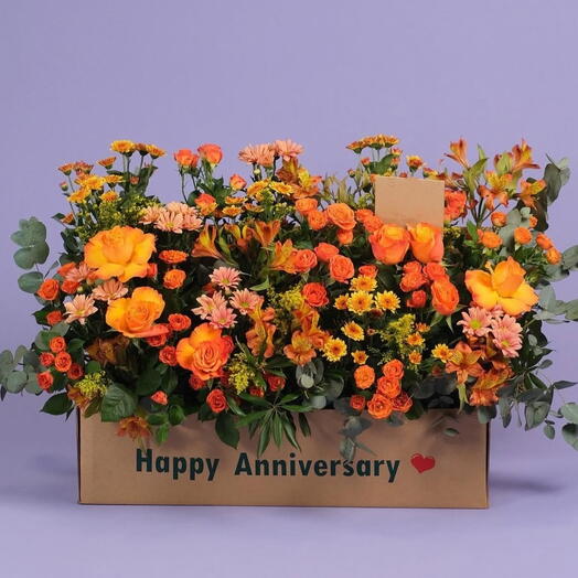 Ornage with yellow Flowers in a box