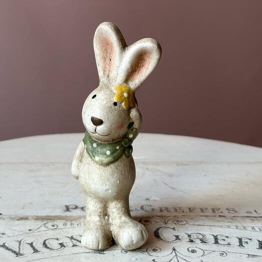 Rabbit figurine with a flower