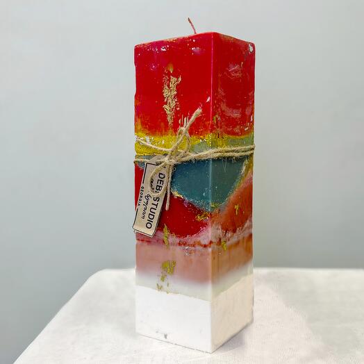Designer red candle with gold
