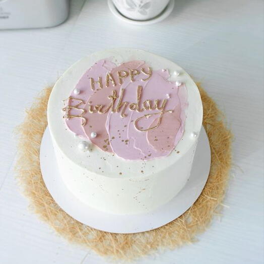 White   different shades of pink birthday cake