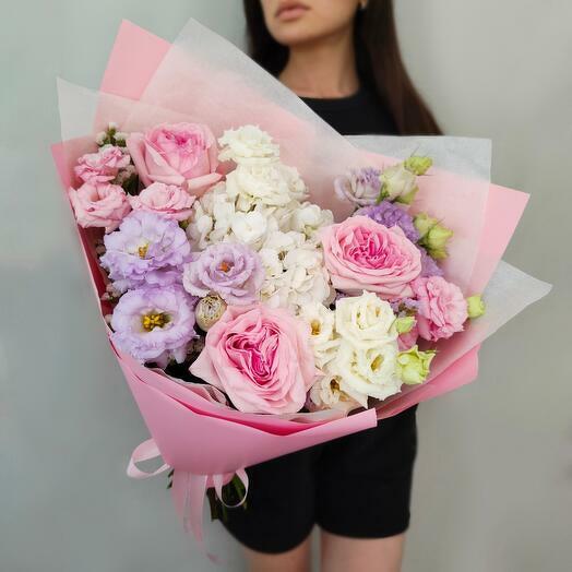 Bouquet of hydrangeas, eustomian peony roses and statice