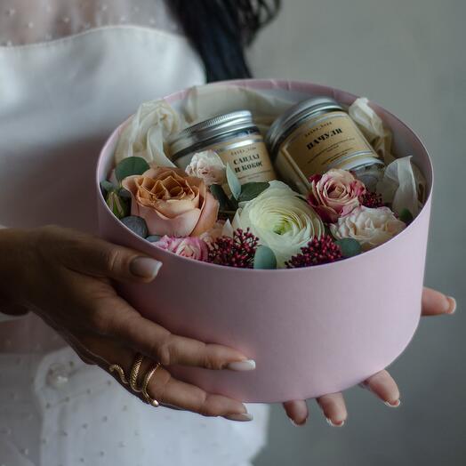 Flowers and candles in a box