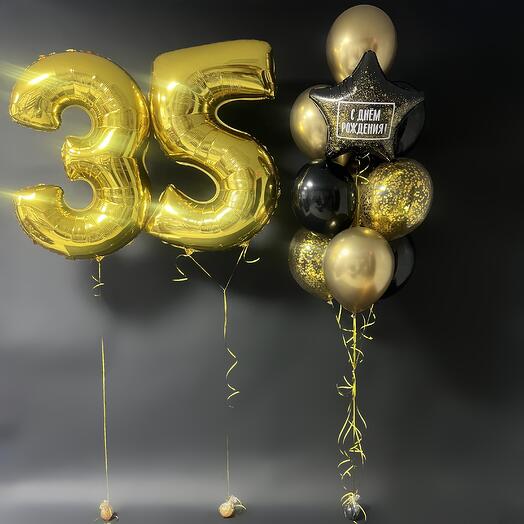 Golden numbers balls and a fountain with a star happy birthday