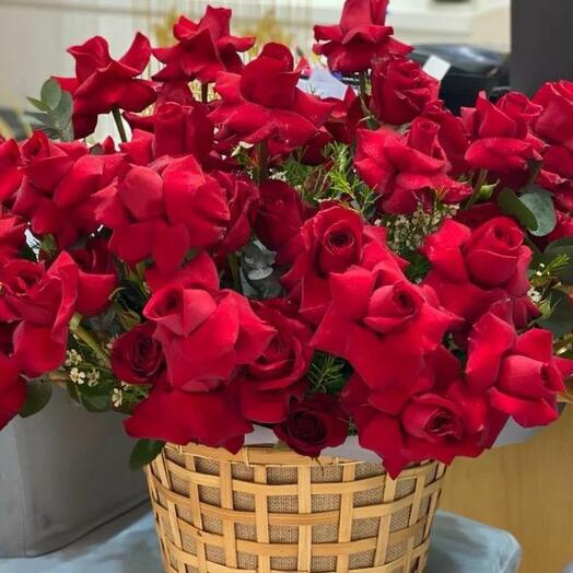RED ROSES IN A BASKET