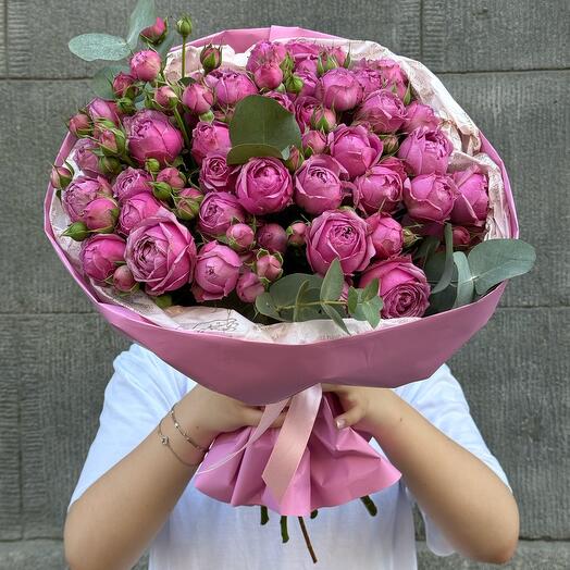 Bouquet of peony roses with eucalyptus