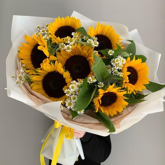Bouquet of sunflowers and chamomiles