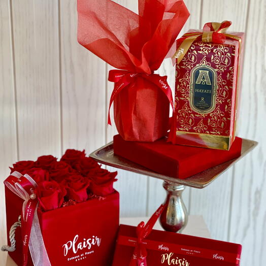 Ultra Luxe Gift Set with red roses chocolates perfume and candle