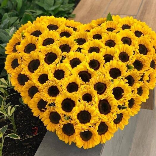 Bouquet of 101 sunflower in heart-shaped basket