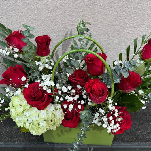 Roses with Hydrangea arranged in a bag;