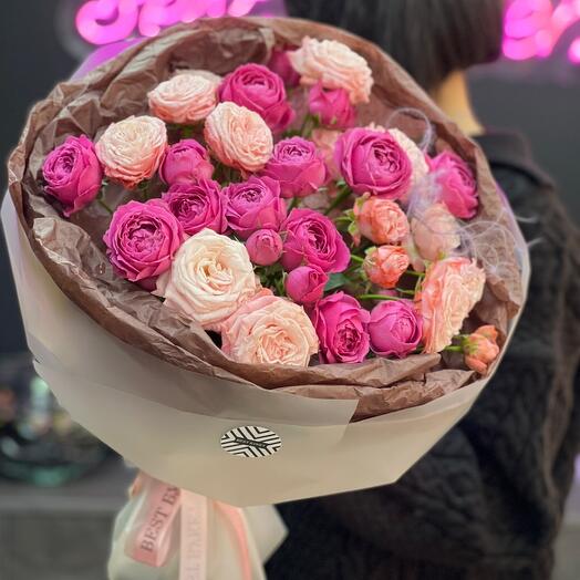 A large bouquet of peonies. bush roses