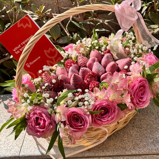 Strawberry in chocolate with flowers