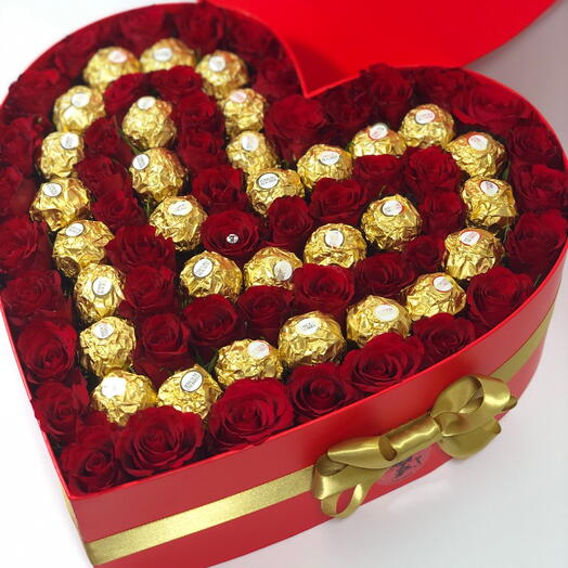 Heart shaped box with beautiful roses and delicious Ferrero Rocher