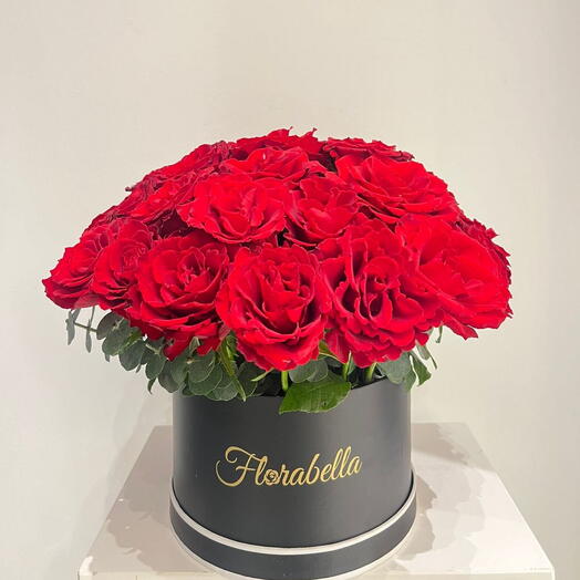 Red Roses in a Round box