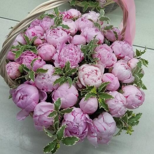 Pink peonies in a basket