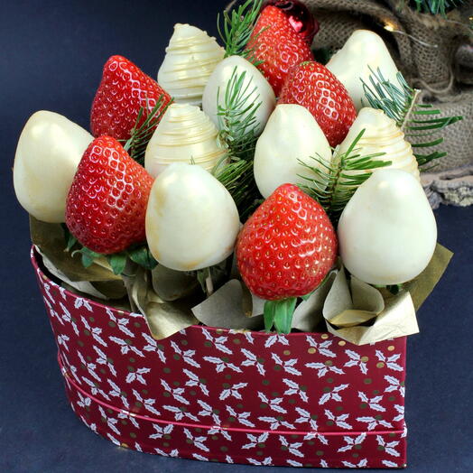 Christmas themed white Chocolate covered strawberries with edible gold in a heart shape