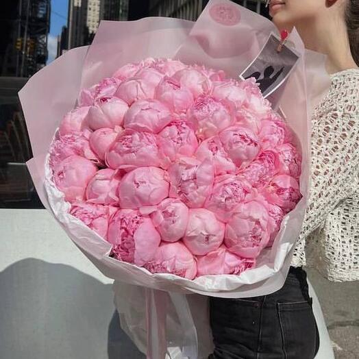 Bouquet of great pink peonies