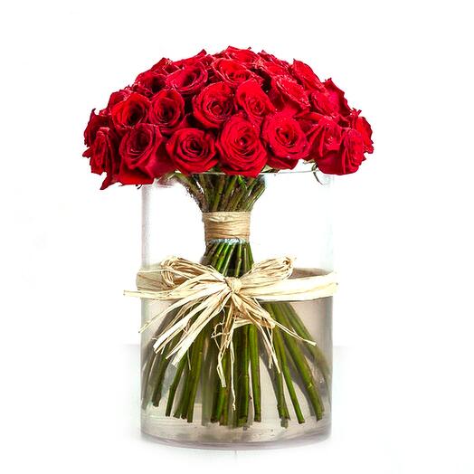 Beautiful Red Roses In Glass Vase