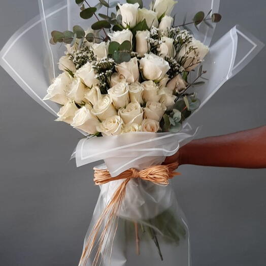 Snowy Serenity Elegance: 20 White Roses with Seasonal Greens