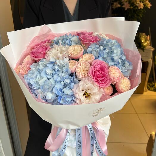 Blue hydrangea, pink roses and spry roses bouquet