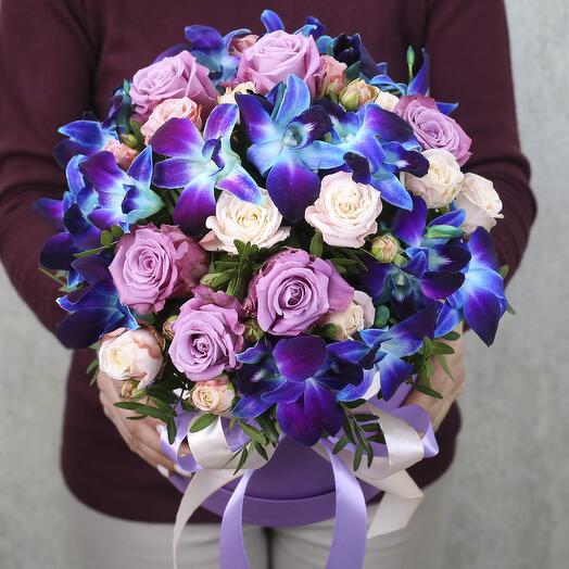 Blue orchids and roses in an Amethyst Breeze box