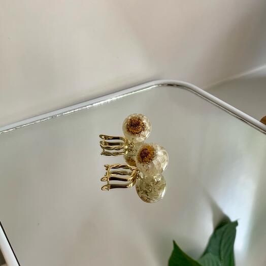 Gold earrings with ammobium flowers
