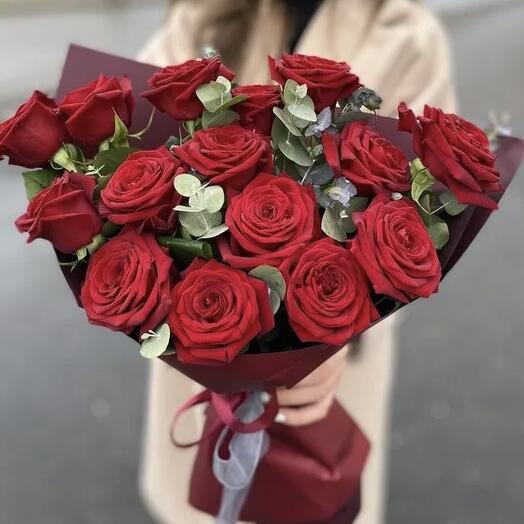 Red roses with eucalyptus in a stylish package