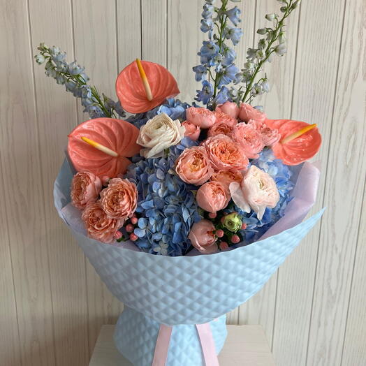 Waffle Bouquet of blue hydrangeas and anthuriums