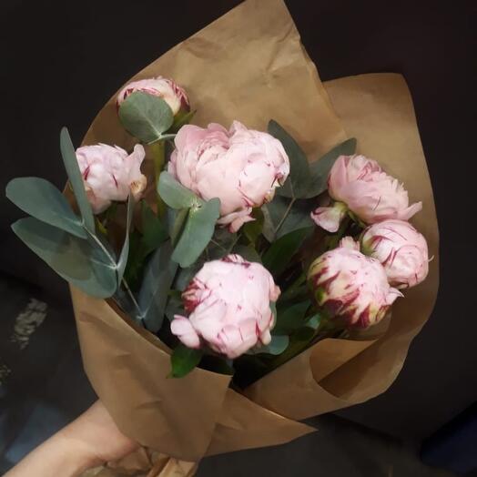 Pink peonies in kraft paper
