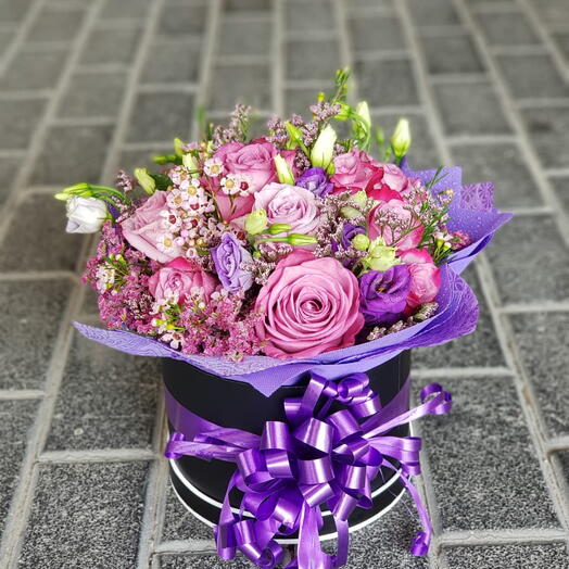 Roseate Petal Haven: 10 Purple Roses, 2 Stems Purple Estoma   3 Stems Purple Wax