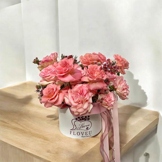 Pink roses in box