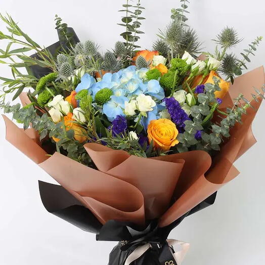 Floral Forest Bouquet: Blue Hydrangea, Orange Roses, White Baby Roses, Eryngium, Green Button Chrysanthemum, Blue Statice