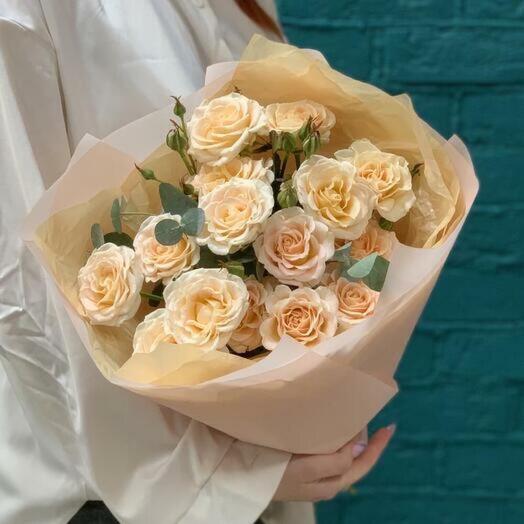 Bouquet of cream bush roses and eucalyptus