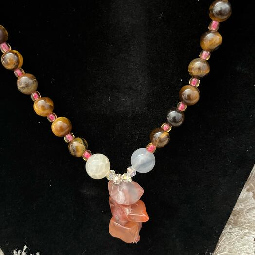 Brown pearls necklace with gem stone pendant