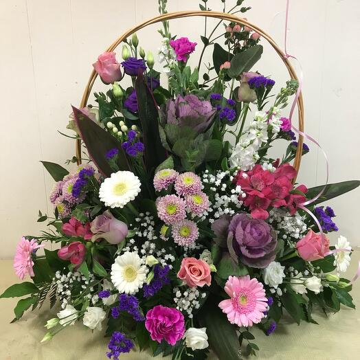 Front facing flowers in basket