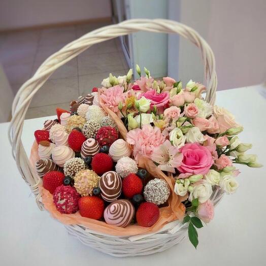 Basket with flowers and chocolate-covered strawberries