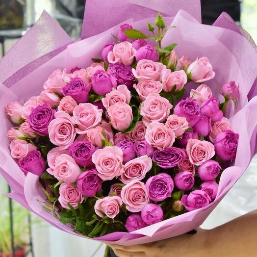 Bouquet of peony bush and spray roses