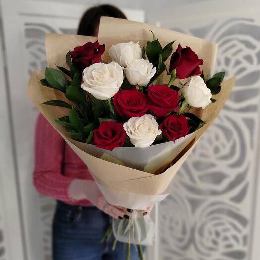 A mix of white and red roses