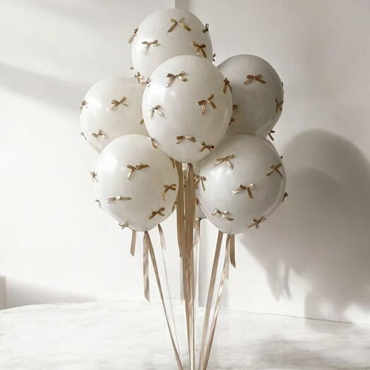 8 helium white baloons with ribbons