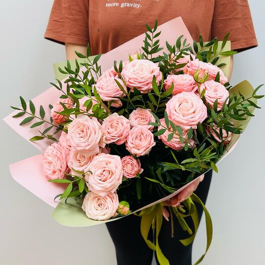Bouquet of bush rose in greenery