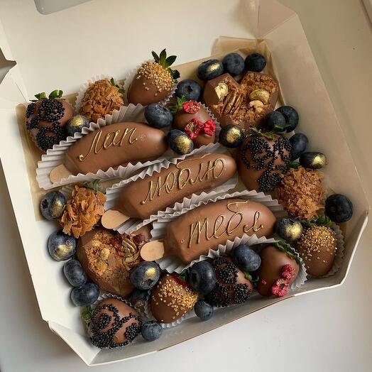 Set of strawberries and bananas in chocolate