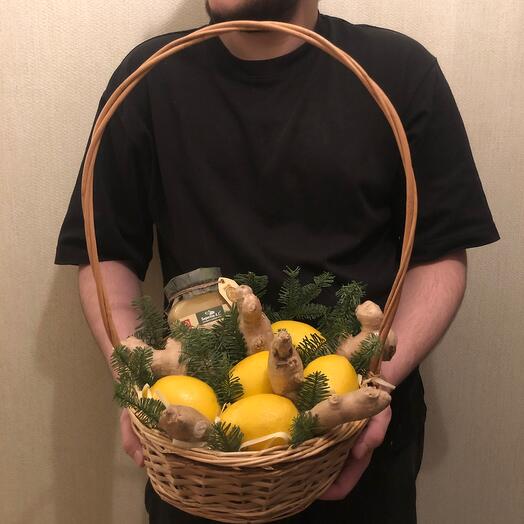 Fruit basket with lemons, honey and ginger