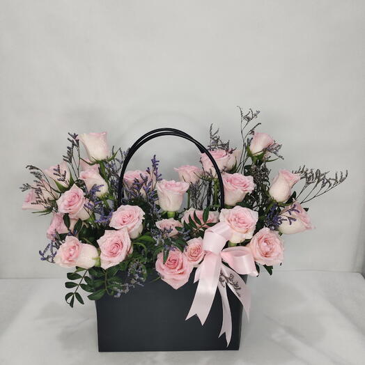 Pink perfection: 24 STEMS OF PINK ROSES IN A BAG