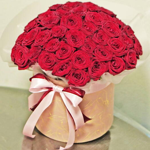 RED ROSES IN A PINK BOX