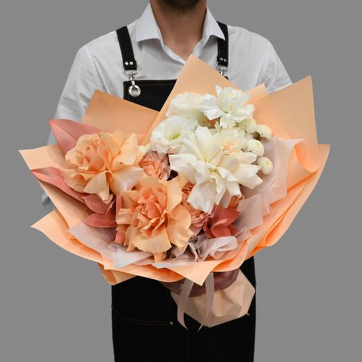 Bouquet with French rose and magnolia leaves