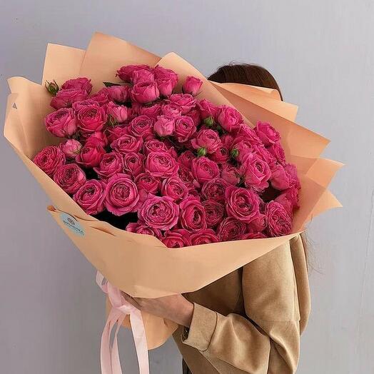 A delicate bouquet of 51 pink bush roses is the perfect choice for your emotions.