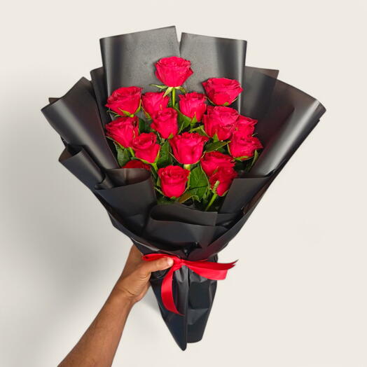 Red Roses in Black Wrap